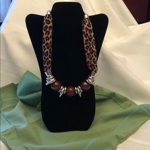 Animal print necklace.